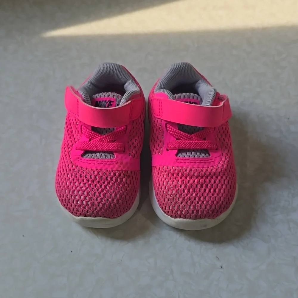 Pink and gray Nike sneakers size 4C